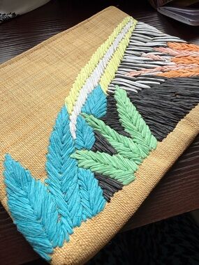 Tabitha Brown • Handwoven Raffia Clutch with Turquoise & Mint Leaf Embroidery